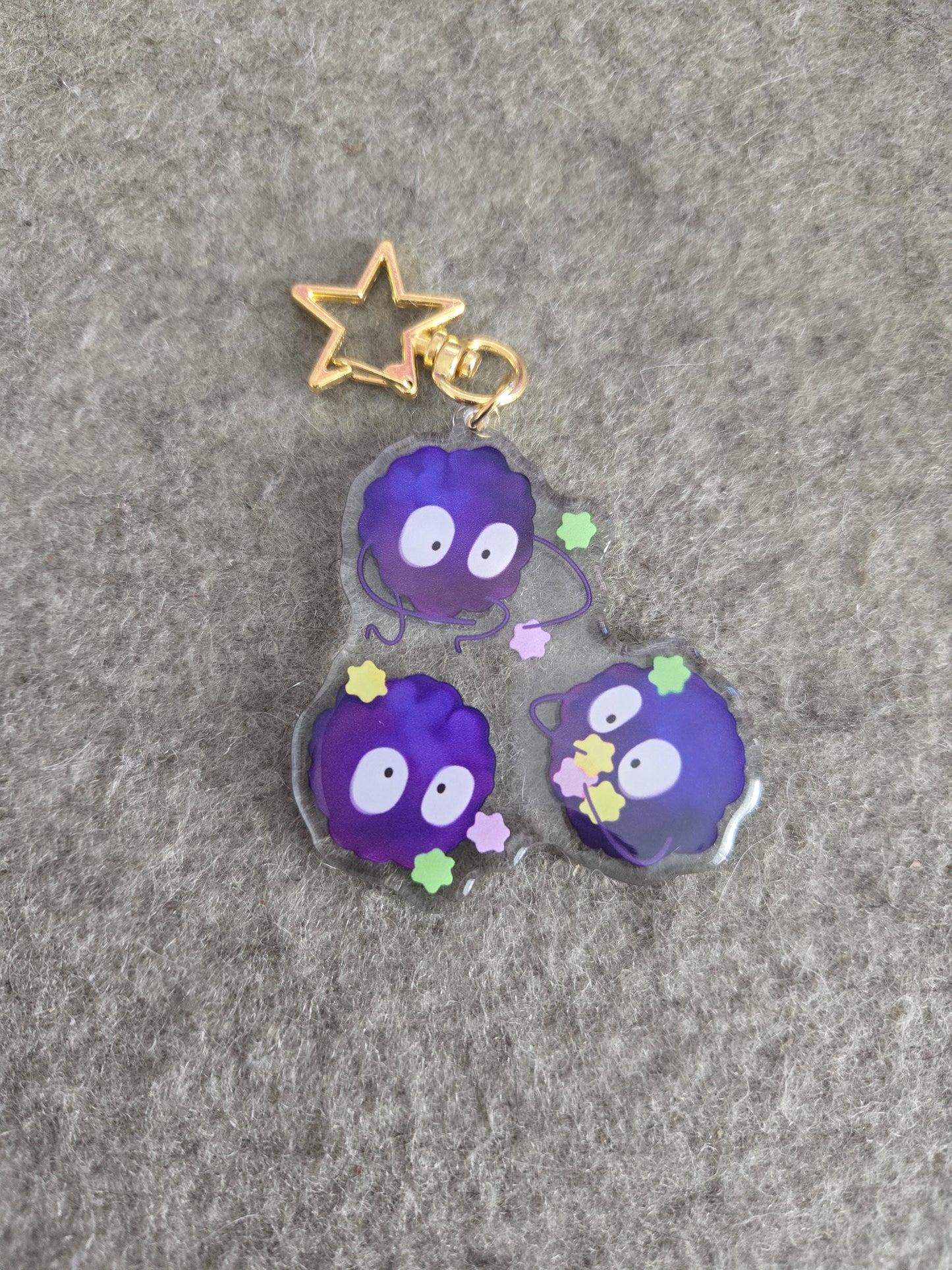 Three Soot Sprites on a Clear acrylic keychain